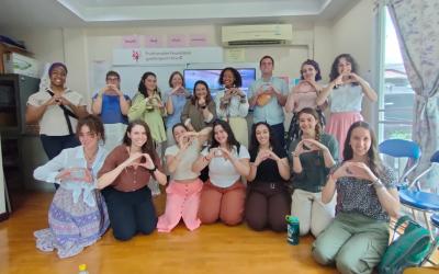 study abroad students making an O shape with their hands